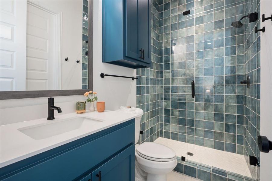 Ensuite bathroom for bedroom 2 with walk-in closet.