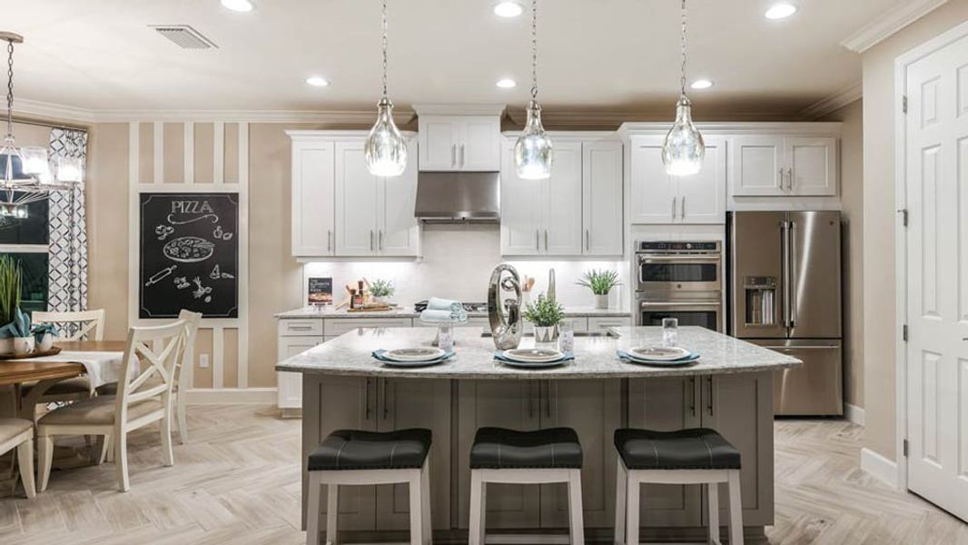 Representative furnished interior of a home built from the Barbados by Taylor Morrison in Central Park, Port St. Lucie (Image 4).