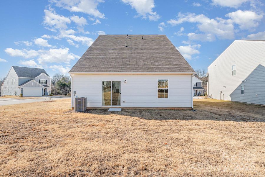 Exterior details and patio area of a home in Sullivan Farm, Statesville (Image 4). Exterior details and patio area of a home in Sullivan Farm, Statesville (Image 4).