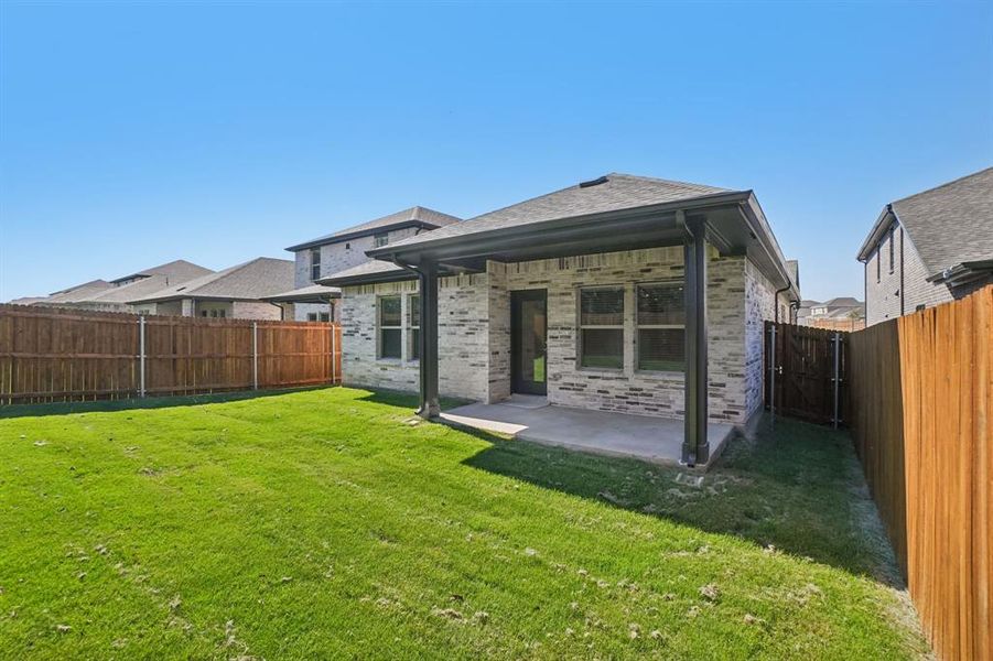 Exterior details and patio area of a home in Eastridge - Spring Series, McKinney (Image 24). Exterior details and patio area of a home in Eastridge - Spring Series, McKinney (Image 24).