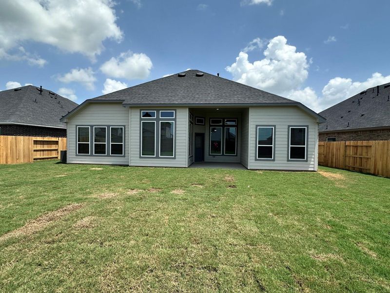 Exterior details and patio area of a home in Creekhaven, Iowa Colony (Image 22). Exterior details and patio area of a home in Creekhaven, Iowa Colony (Image 22).