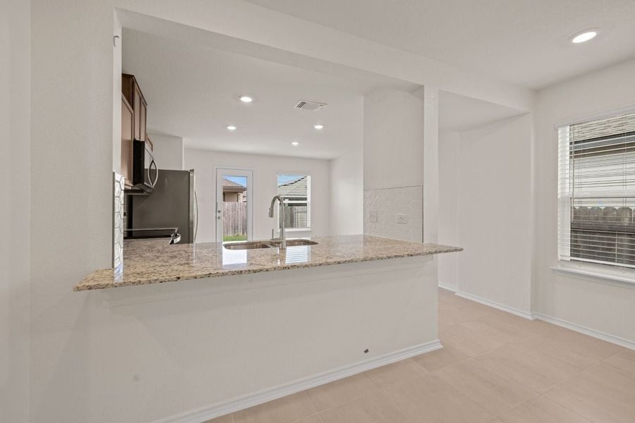 Furnished interior view inside a new home in Sonterra - Cool Water, Jarrell (Image 6).