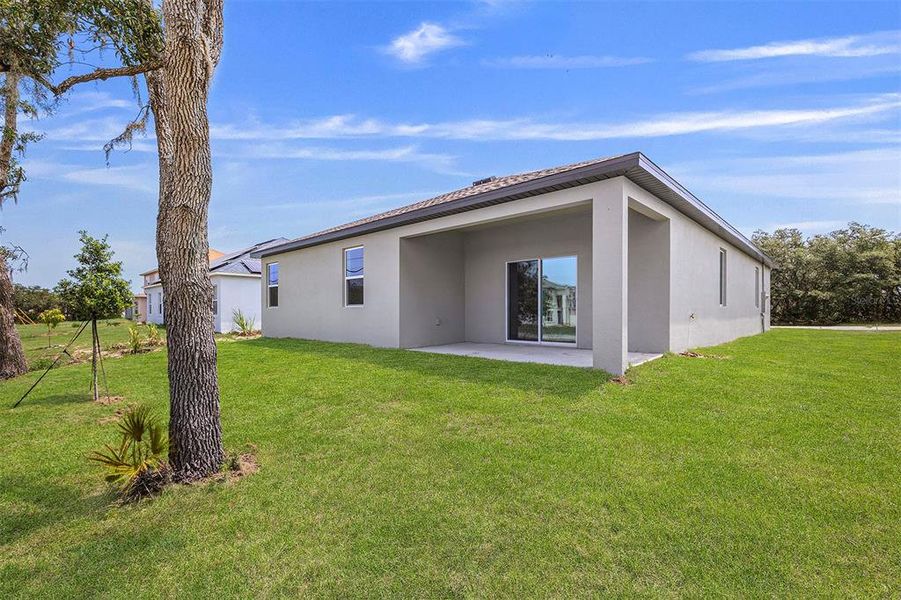 Exterior details and patio area of a home in Poinciana, Poinciana (Image 2). Exterior details and patio area of a home in Poinciana, Poinciana (Image 2).