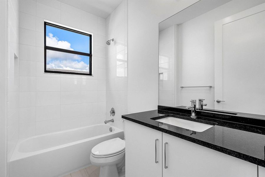 Furnished interior view inside a new home in Lotus Edge, Boca Raton (Image 15).