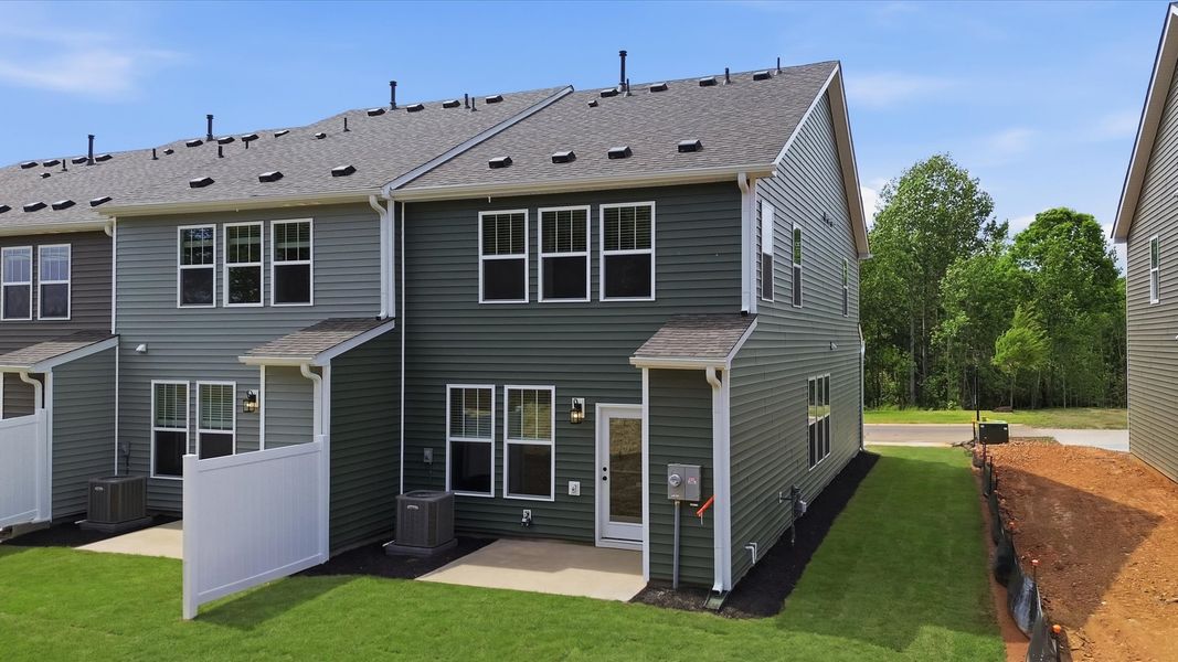 Vibrant rear outdoor space featuring a private patio and exceptional craftsmanship at the new Marion Square community Vibrant rear outdoor space featuring a private patio and exceptional craftsmanship at the new Marion Square community