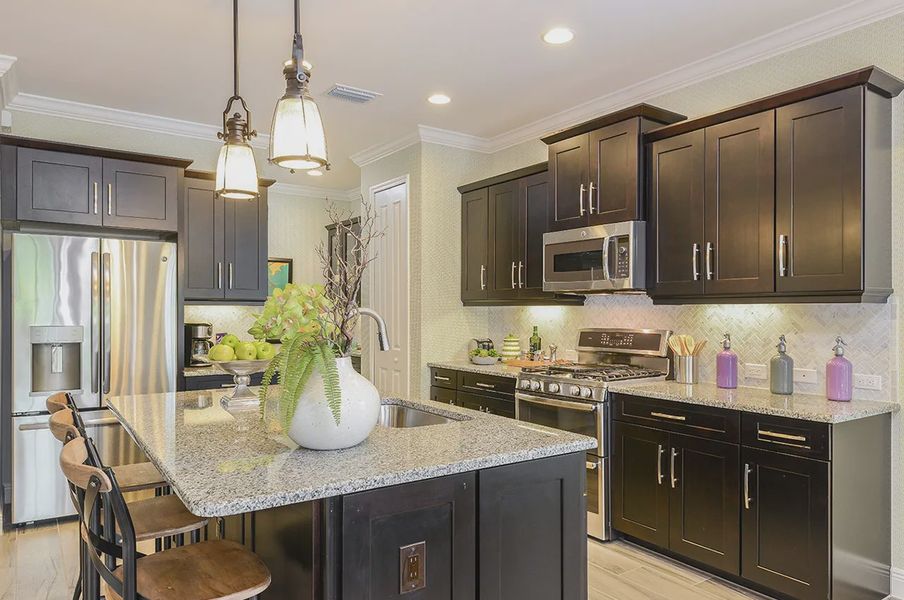 Representative furnished interior of a home built from the White Star by Neal Communities in SkySail, Naples (Image 17).