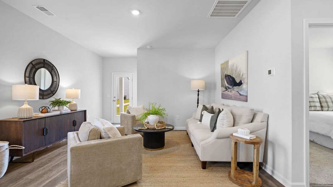Furnished interior view inside a new home in The Groves at Bees Creek, Ridgeland (Image 9). Furnished interior view inside a new home in The Groves at Bees Creek, Ridgeland (Image 9).