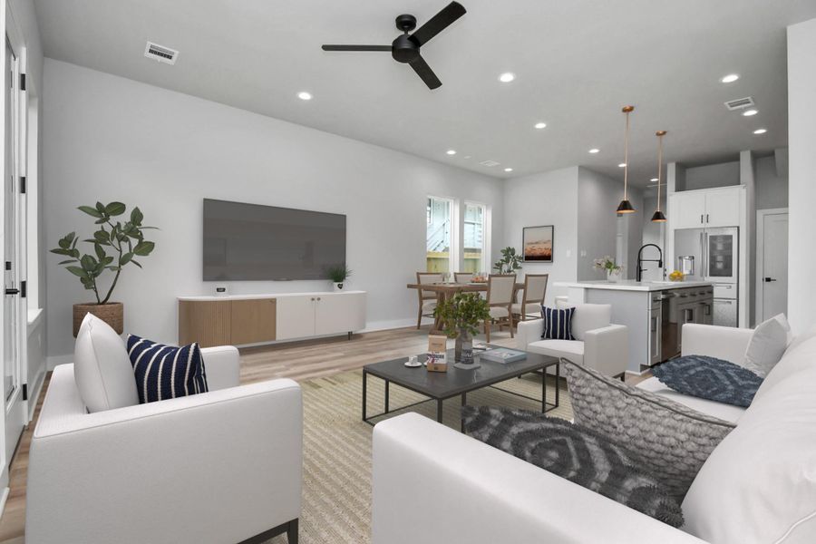 Open-concept living with modern finishes and a seamless flow to the kitchen and dining area. Bright, inviting space designed for comfortable everyday living and entertaining.