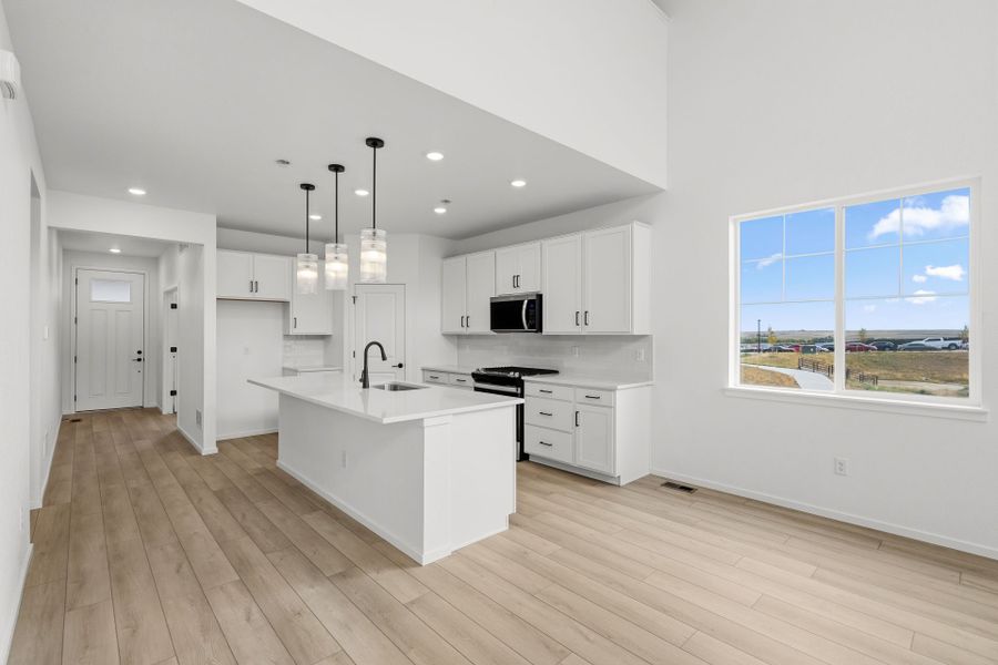 Furnished interior view inside a new home in Harvest Crossing, Aurora (Image 12).