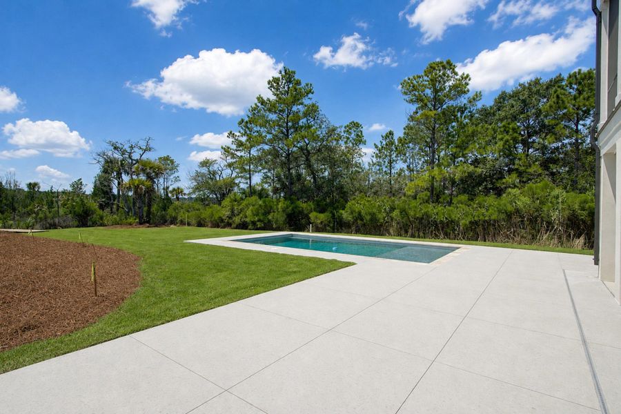 Exterior details and patio area of a home in , Awendaw (Image 21).