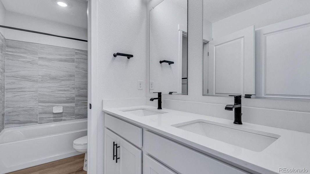 Furnished interior view inside a new home in Trails at Crowfoot, Parker (Image 13).