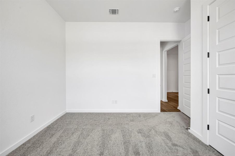 Spacious, unfurnished interior of a new home in Heritage, Dripping Springs (Image 21).