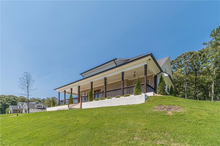 Front exterior of a new home in , Dacula, GA, highlighting curb appeal (Image 25).