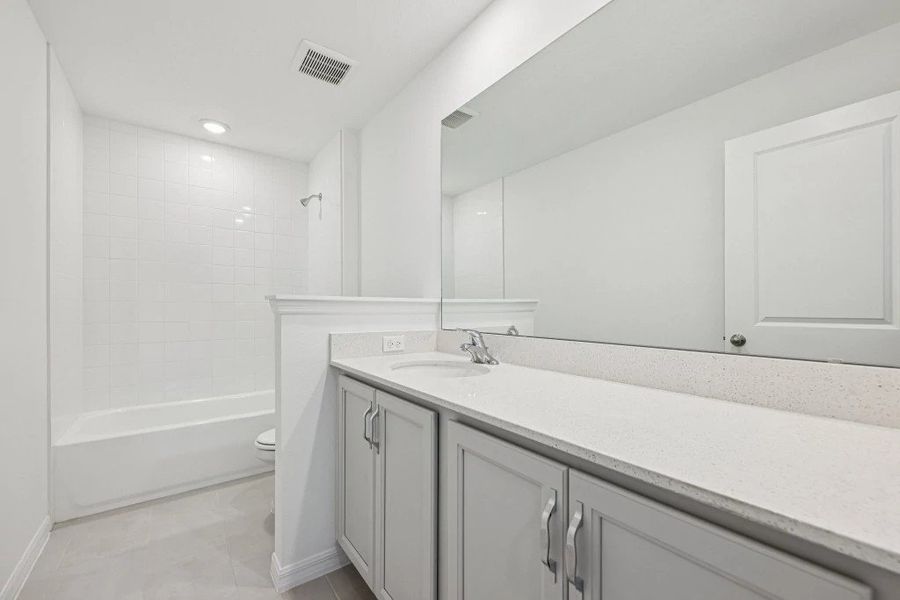 Furnished interior view inside a new home in Northlake at Ovation, Winter Garden (Image 14).