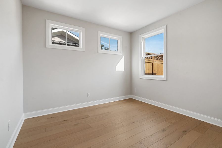 Representative unfurnished interior of a home built from the 
                        
                         by The Providence Group in Ward's Crossing Townhomes, Johns Creek (Image 27).