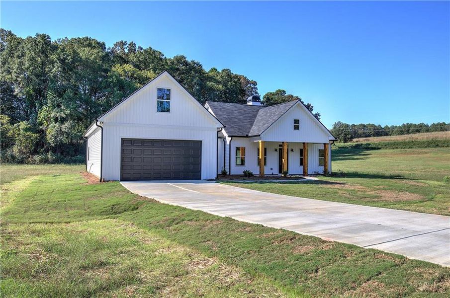 Front exterior of a new home in , Taylorsville, GA, highlighting curb appeal (Image 21).