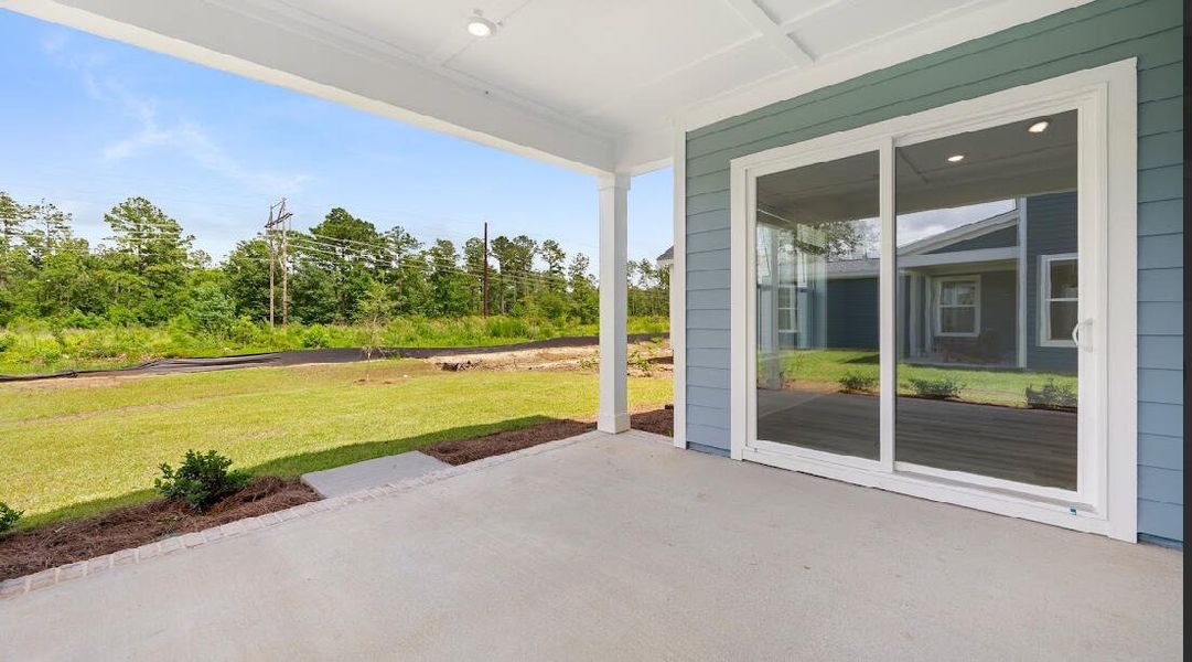 Exterior details and patio area of a home in Midtown at Nexton, Summerville (Image 15). Exterior details and patio area of a home in Midtown at Nexton, Summerville (Image 15).