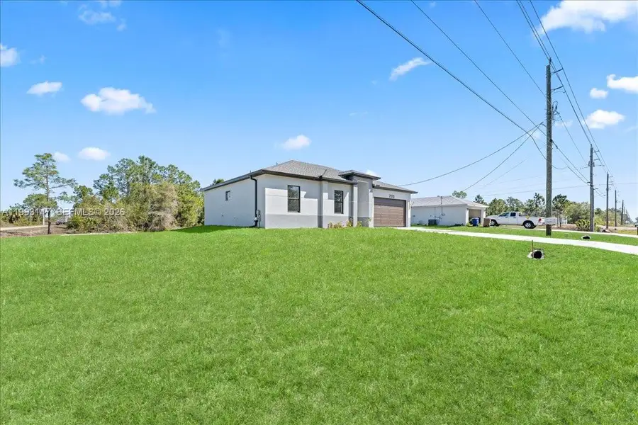Exterior details and patio area of a home in , Lehigh Acres (Image 3).