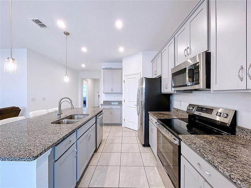 Furnished interior view inside a new home in Covered Bridge at Liberty Bluff, Haines City (Image 10).