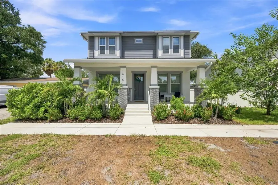 Front exterior of a new home in , Tampa, FL, highlighting curb appeal (Image 2). Front exterior of a new home in , Tampa, FL, highlighting curb appeal (Image 2).