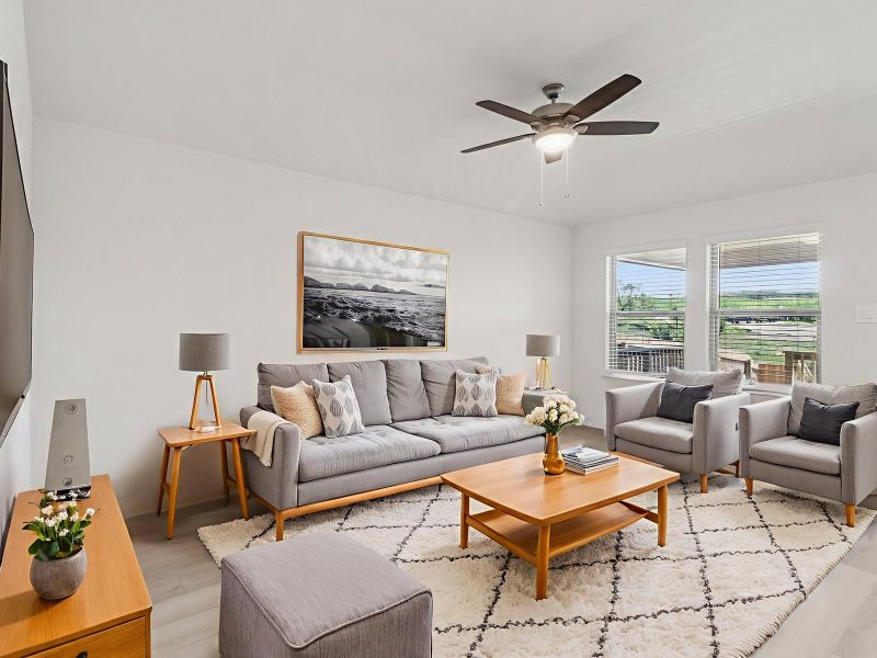 Virtually staged living room in the Callaghan floorplan at a Meritage Homes community. Virtually staged living room in the Callaghan floorplan at a Meritage Homes community.