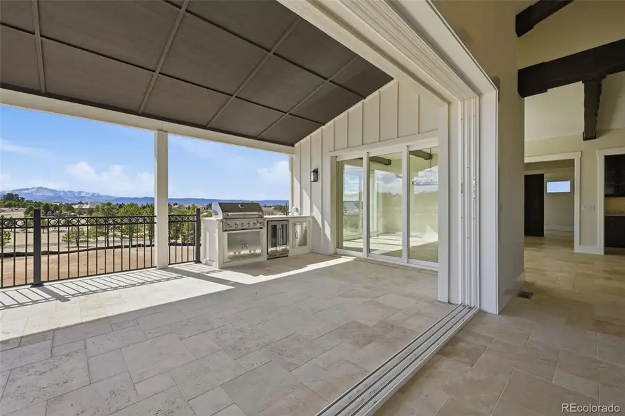 Main Level view from Great Room and retractable window wall Main Level view from Great Room and retractable window wall