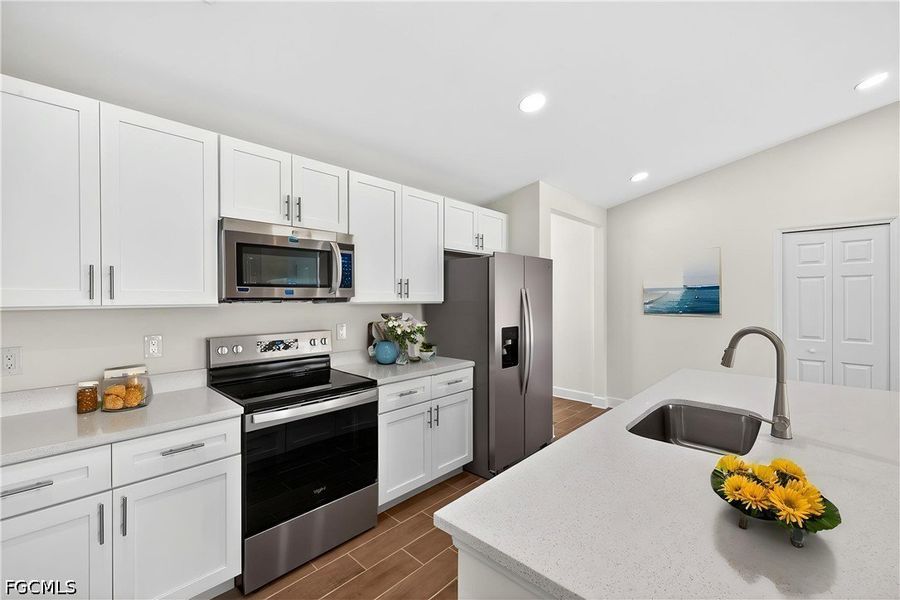 Furnished interior view inside a new home in Cape Coral, Cape Coral (Image 6). Furnished interior view inside a new home in Cape Coral, Cape Coral (Image 6).