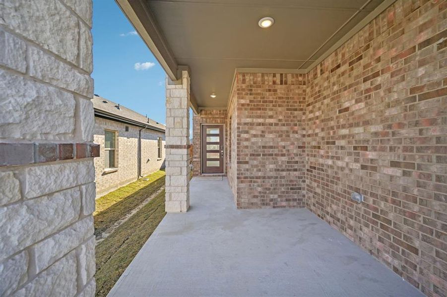 Exterior details and patio area of a home in Eastridge - Spring Series, McKinney (Image 3).