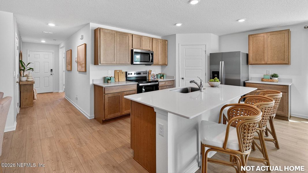 Furnished interior view inside a new home in Sawmill Branch, Palm Coast (Image 26).