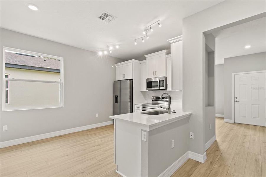 Furnished interior view inside a new home in , Apopka (Image 5).