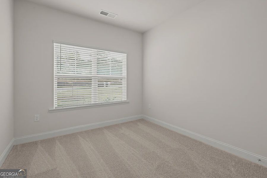 Spacious, unfurnished interior of a new home in Canterbury Villas, Carrollton (Image 24).