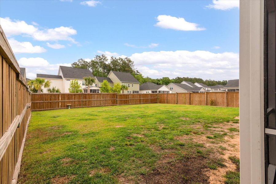 Exterior details and patio area of a home in Sweetgrass at Summers Corner, Summerville (Image 30).