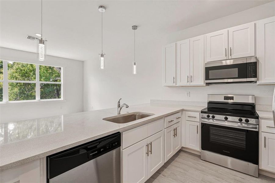 Furnished interior view inside a new home in , Punta Gorda (Image 12).