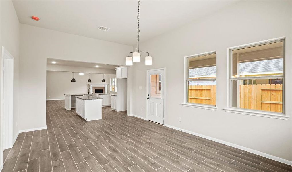 View of kitchen and dining area (*Photo not of actual home and used for illustration purposes only.)