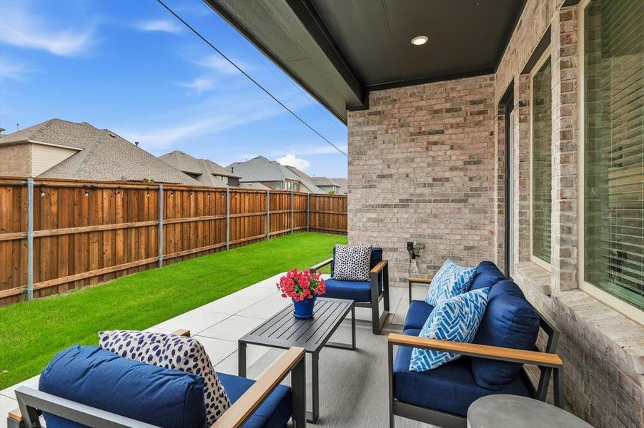 Exterior details and patio area of a home in Estates at Stacy Crossing, McKinney (Image 21).