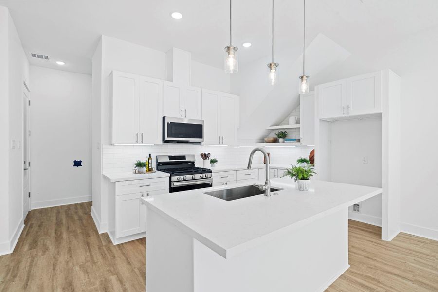Classic, white kitchen with upgrades like soft close cabinets
