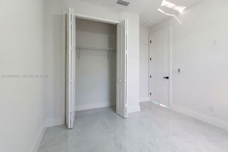 Spacious, unfurnished interior of a new home in , Lehigh Acres (Image 43).