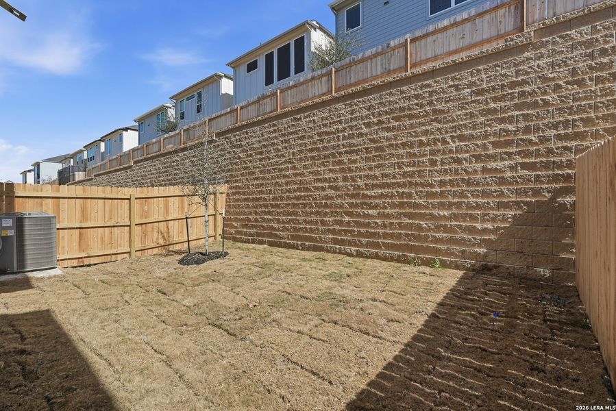 Exterior details and patio area of a home in Rose Hill, San Antonio (Image 4).