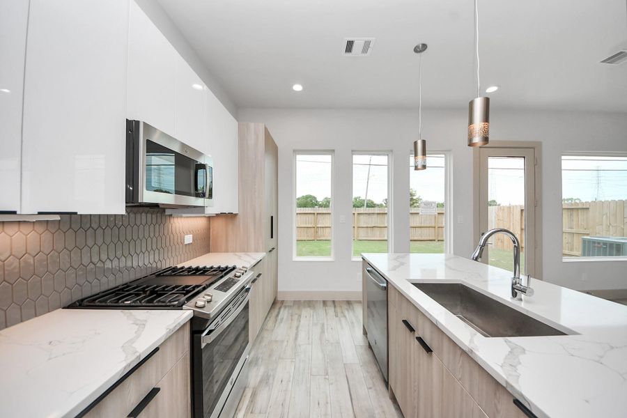 Furnished interior view inside a new home in Agua, Houston (Image 11). Furnished interior view inside a new home in Agua, Houston (Image 11).