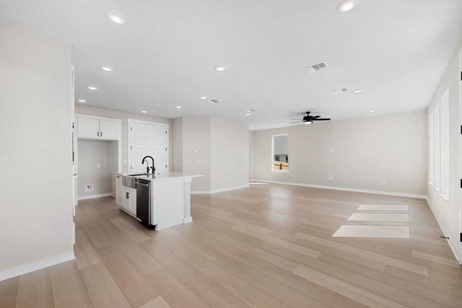 Spacious, unfurnished interior of a new home in Terrace Collection At Turner's Crossing, Buda (Image 24).