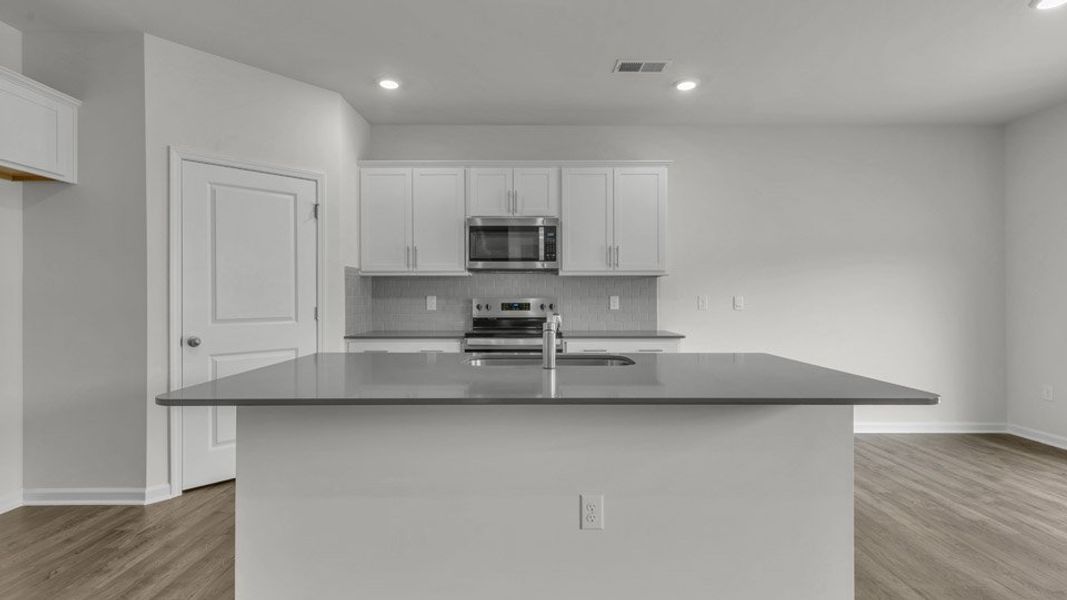 Furnished interior view inside a new home in The Preserve at Kinsley, Jamestown (Image 4). Furnished interior view inside a new home in The Preserve at Kinsley, Jamestown (Image 4).