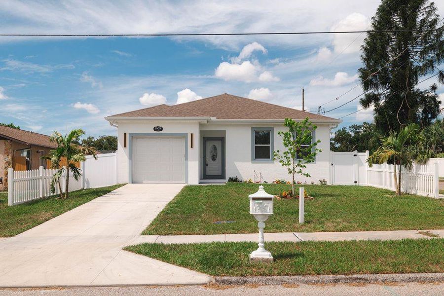 Front exterior of a new home in , Tampa, FL, highlighting curb appeal (Image 22). Front exterior of a new home in , Tampa, FL, highlighting curb appeal (Image 22).