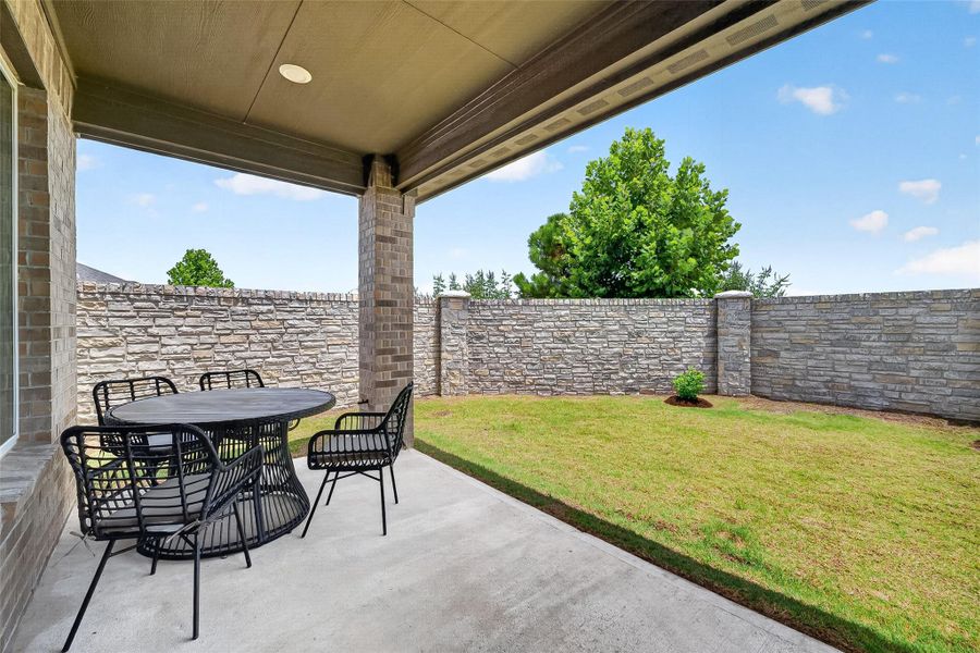 Exterior details and patio area of a home in Avalon at Cypress, Cypress (Image 22). Exterior details and patio area of a home in Avalon at Cypress, Cypress (Image 22).