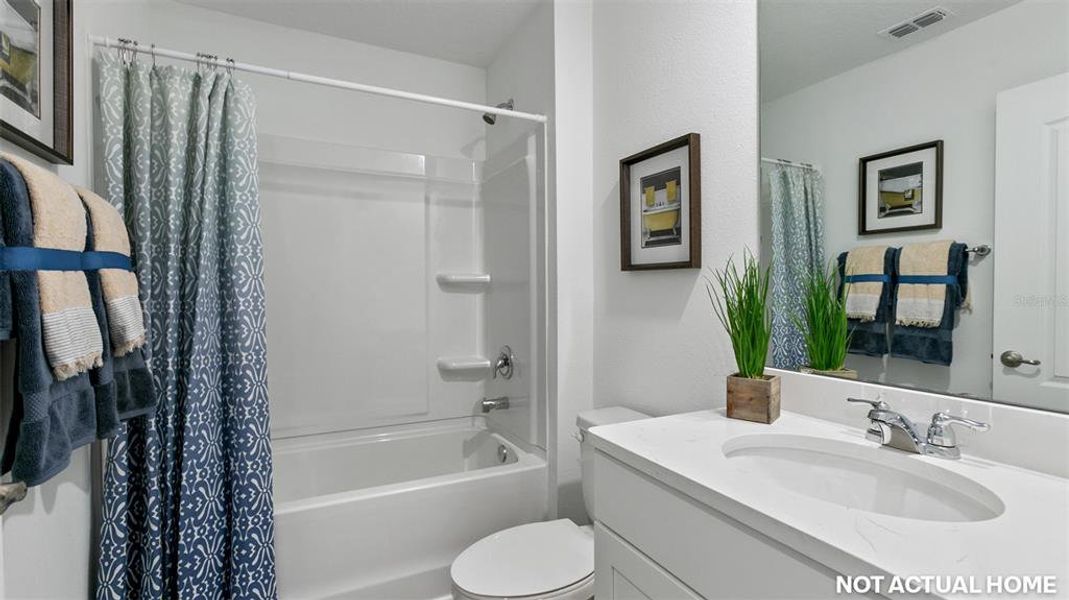Furnished interior view inside a new home in Sawmill Branch, Palm Coast (Image 26).