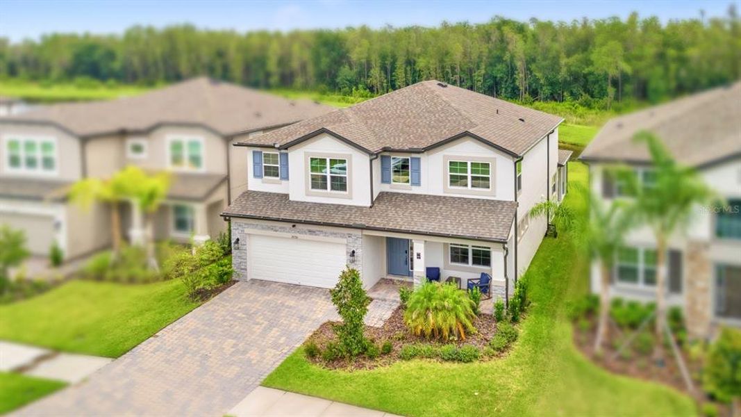 Front exterior of a new home in , Tampa, FL, highlighting curb appeal (Image 28).