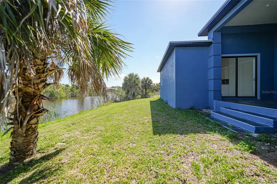 Exterior details and patio area of a home in , Port Charlotte (Image 28).