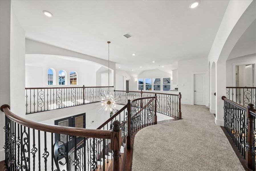 Second floor hallway with carpet flooring, healthy amount of natural light, and recessed lighting Second floor hallway with carpet flooring, healthy amount of natural light, and recessed lighting