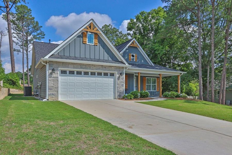 Front exterior of a new home in , Lawrenceville, GA, highlighting curb appeal (Image 20).