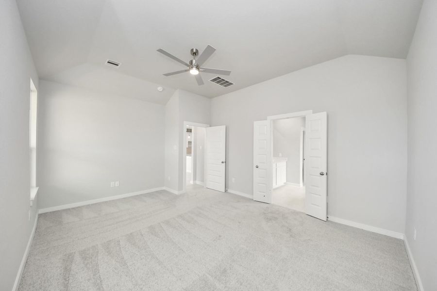 Another perspective unveils a comprehensive view of the serenity and comfort this primary suite offers. Another perspective unveils a comprehensive view of the serenity and comfort this primary suite offers.