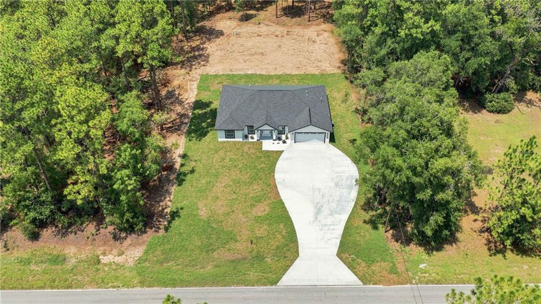 Front exterior of a new home in , Dunnellon, FL, highlighting curb appeal (Image 19). Front exterior of a new home in , Dunnellon, FL, highlighting curb appeal (Image 19).